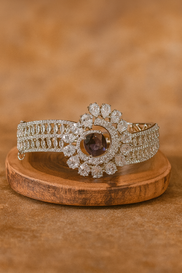 Elegant Silver Bracelet with Purple Floral Centerpiece