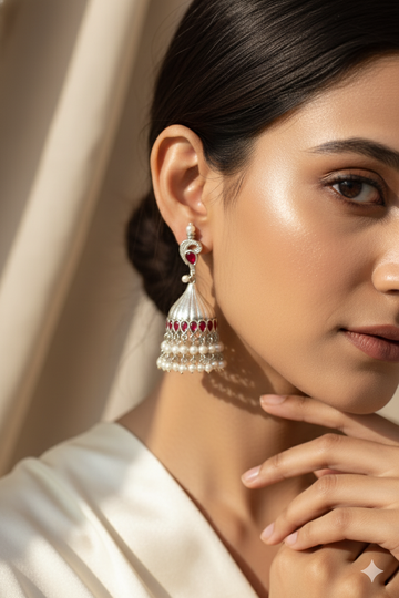 Ruby Red Jhumka Earrings in Oxidised German Silver with Pearl Tassels