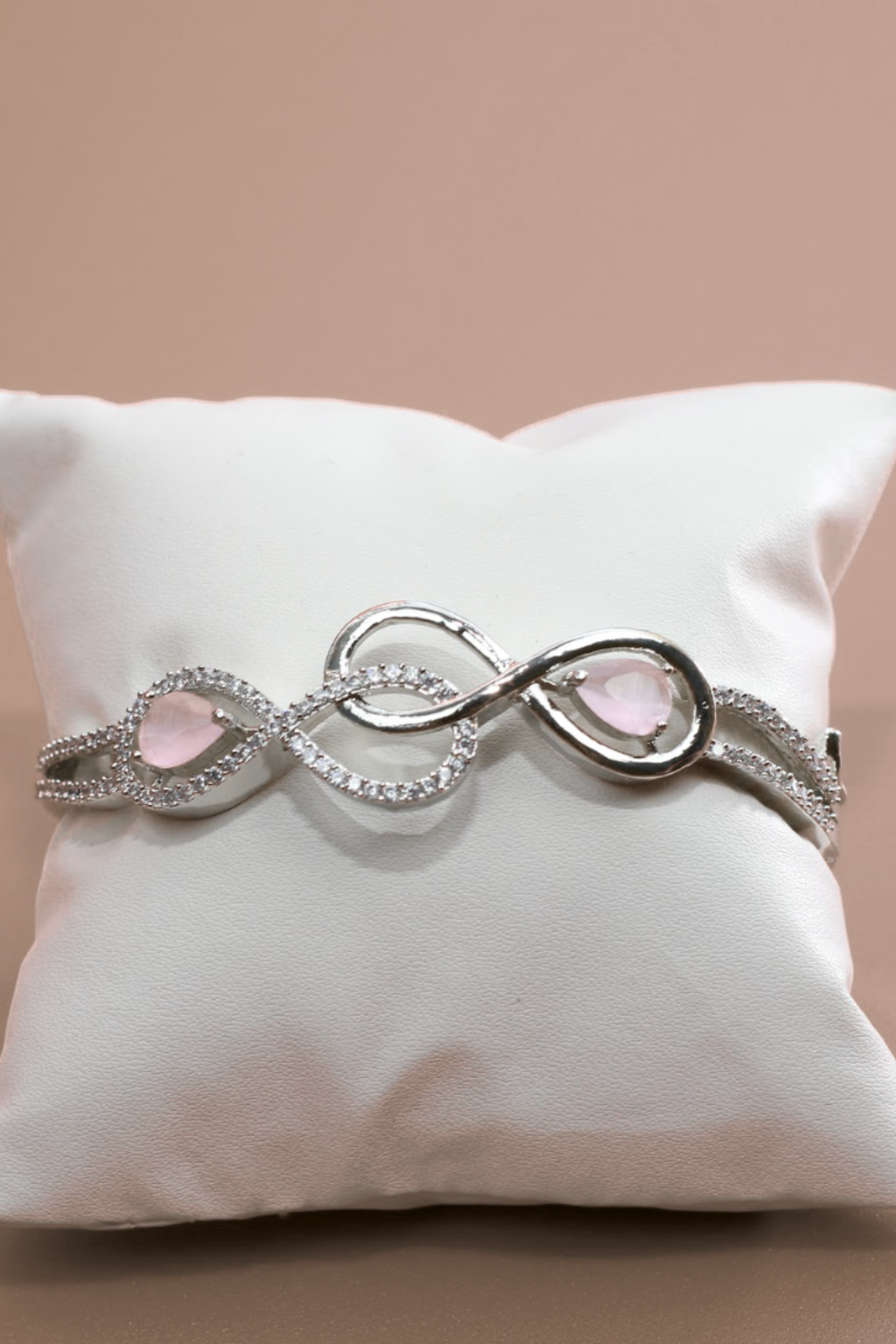 Infinity Curve Silver Bracelet with Soft Pink Stones