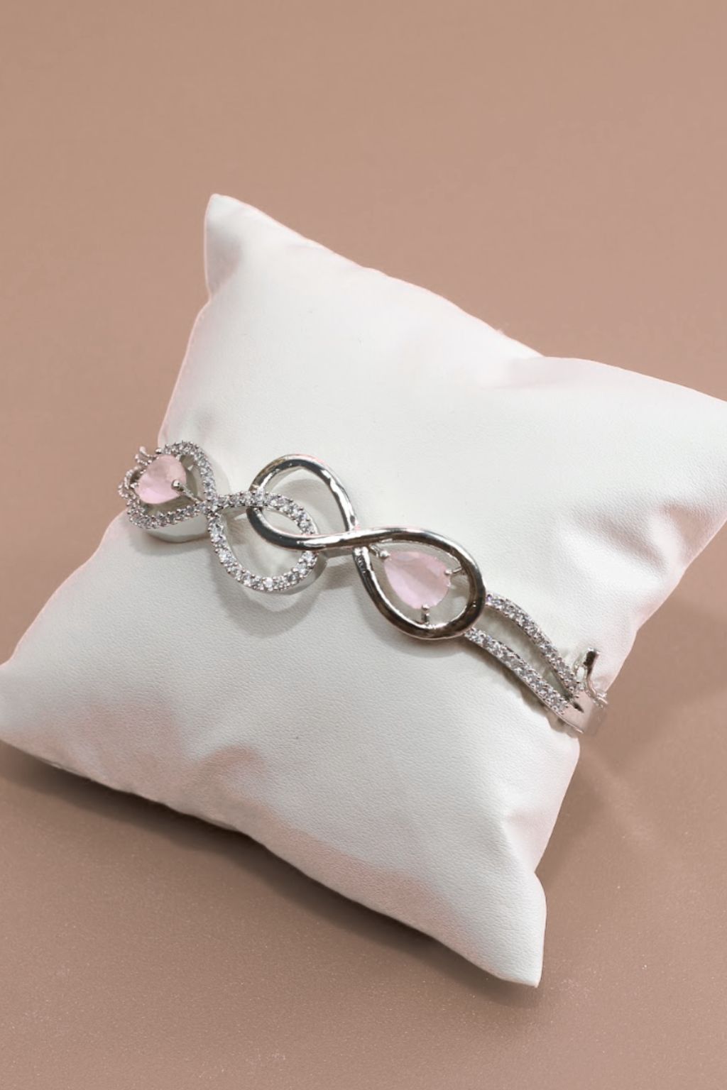 Infinity Curve Silver Bracelet with Soft Pink Stones