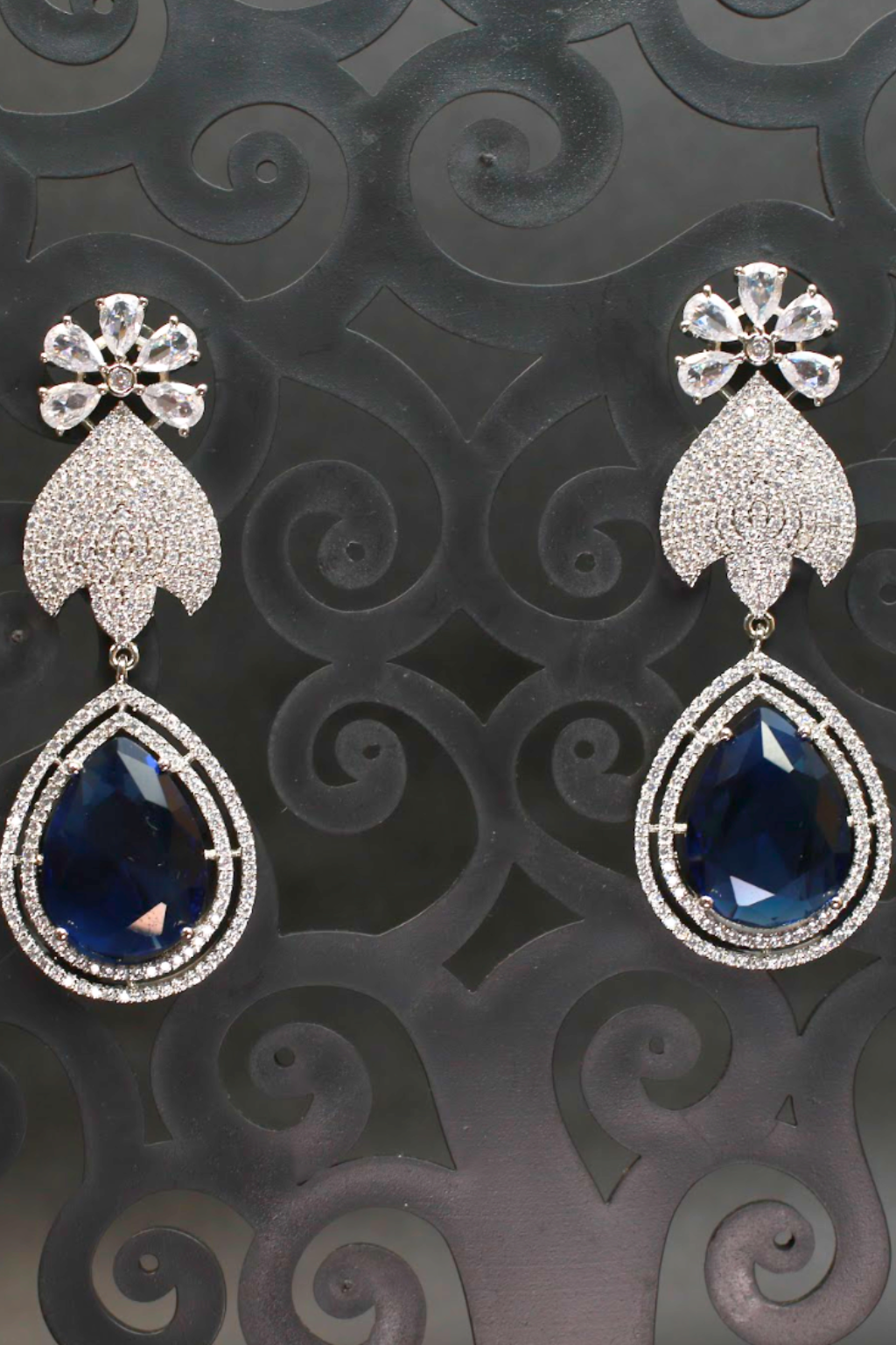 Floral Stud Earrings with Large Blue Drop