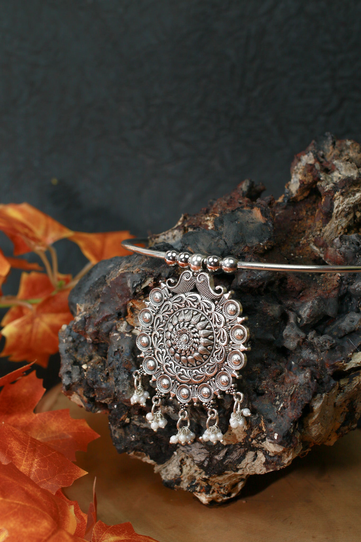 Oxidised German Silver Hansli Necklace with Ornate Floral Disc Pendant