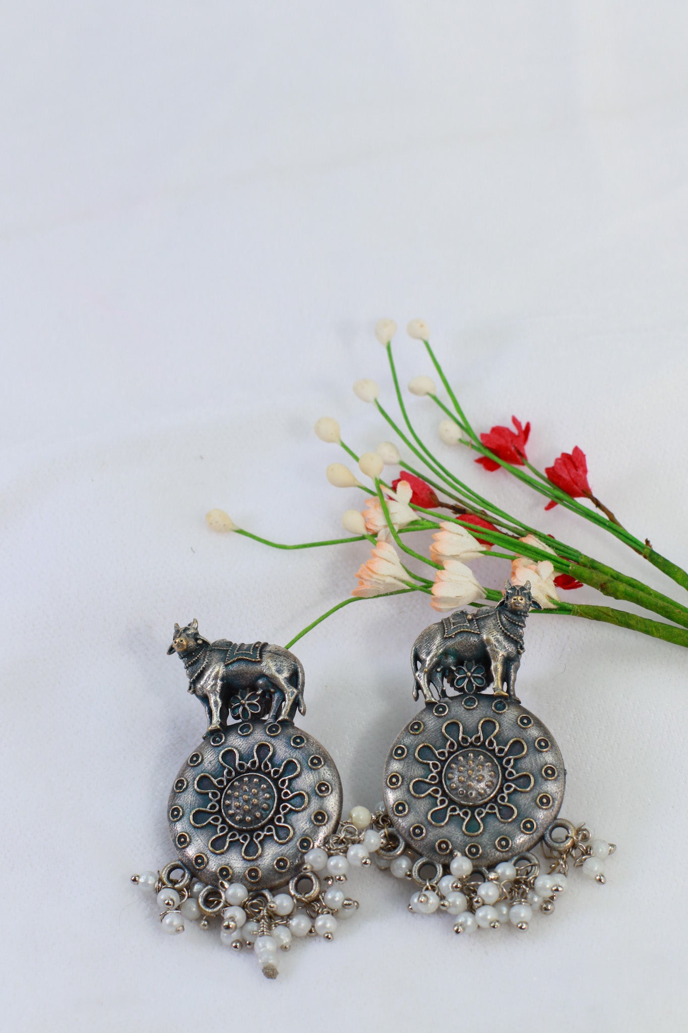 Oxidised German Silver Cow Design Earrings with Pearl Drops