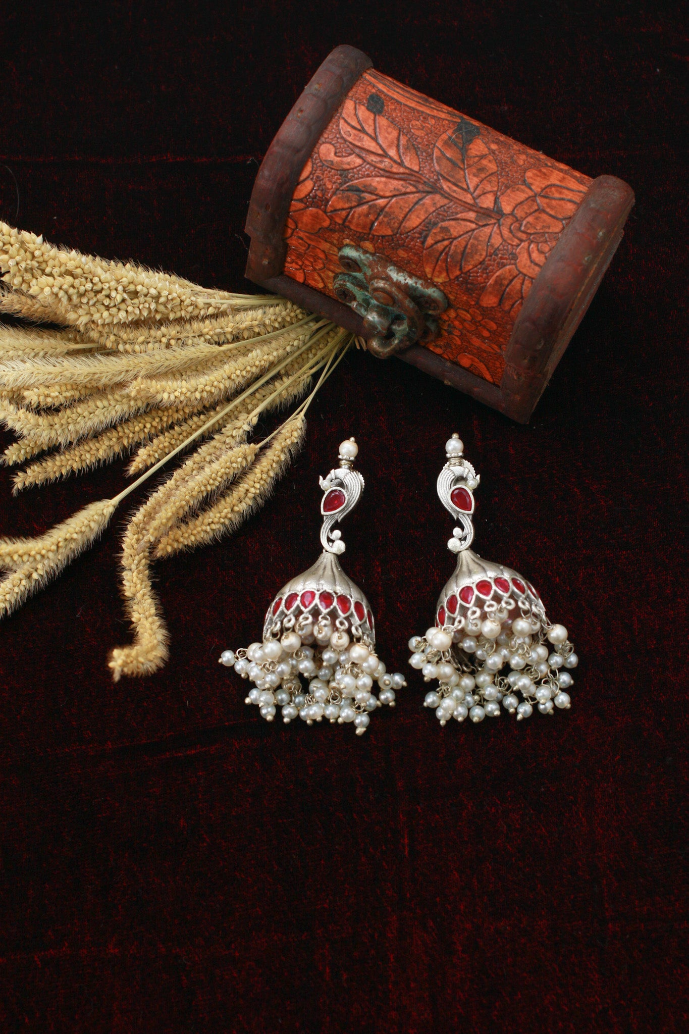 Ruby Red Jhumka Earrings in Oxidised German Silver with Pearl Tassels