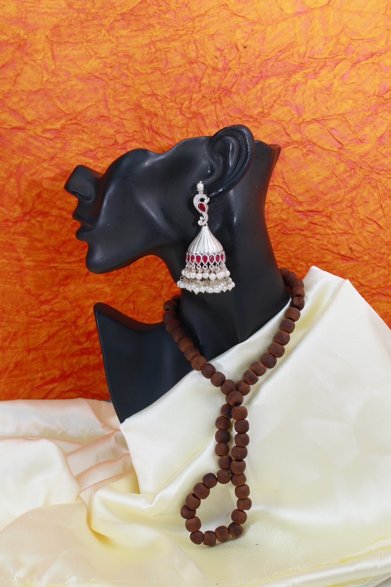 Ruby Red Jhumka Earrings in Oxidised German Silver with Pearl Tassels