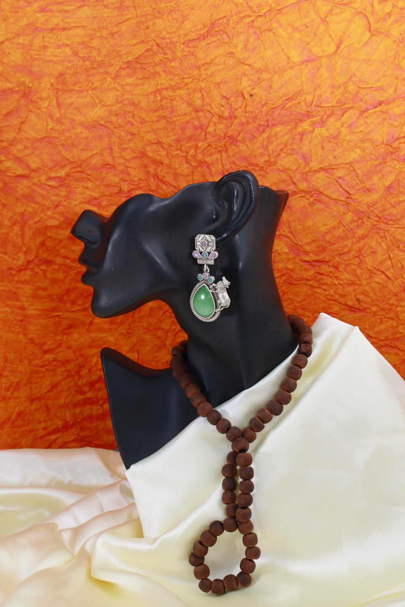 Temple Cow Motif Teardrop Earrings with Green Monalisa | Oxidised German Silver