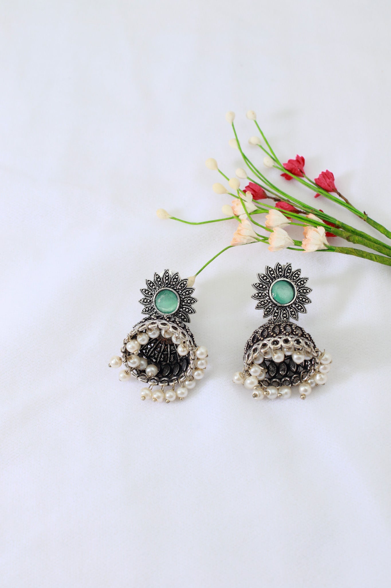 Green Monalisa Stone Oxidised German Silver Jhumka Earrings with Pearl Drops