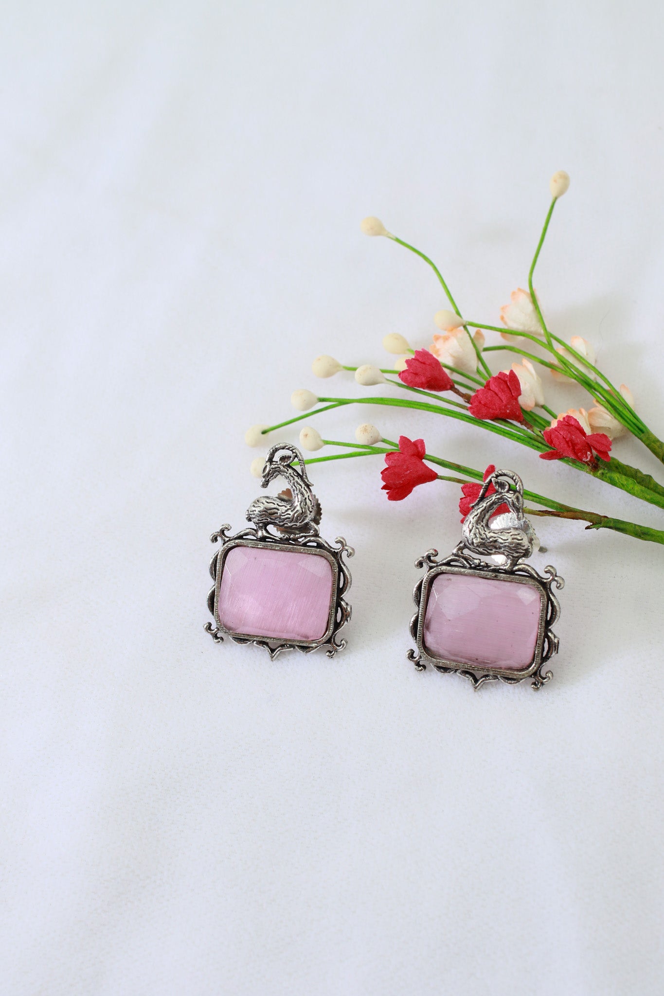 Pink Monalisa Rectangle Oxidised German Silver Earrings with Deer Motif