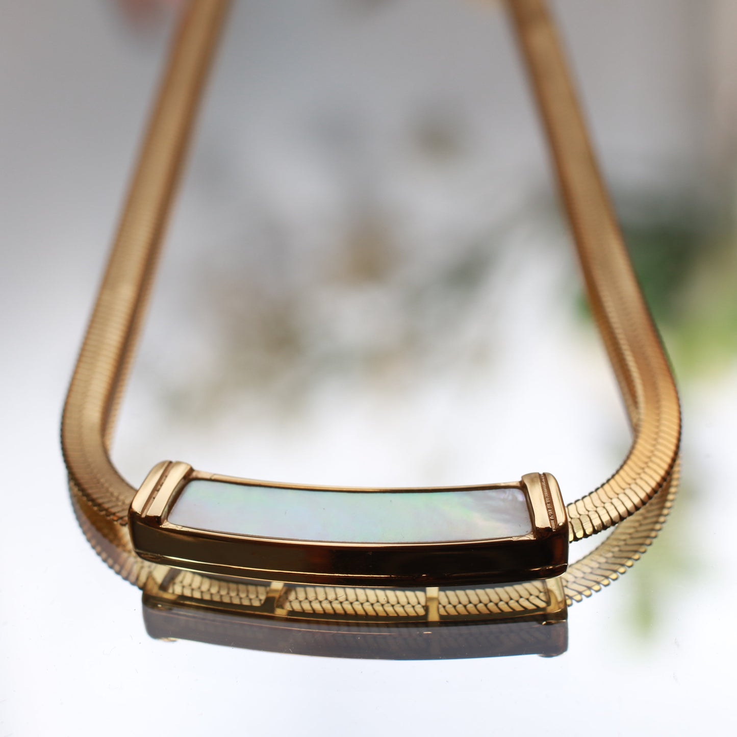 Sleek Mother of Pearl Pendant with Gold Snake Chain