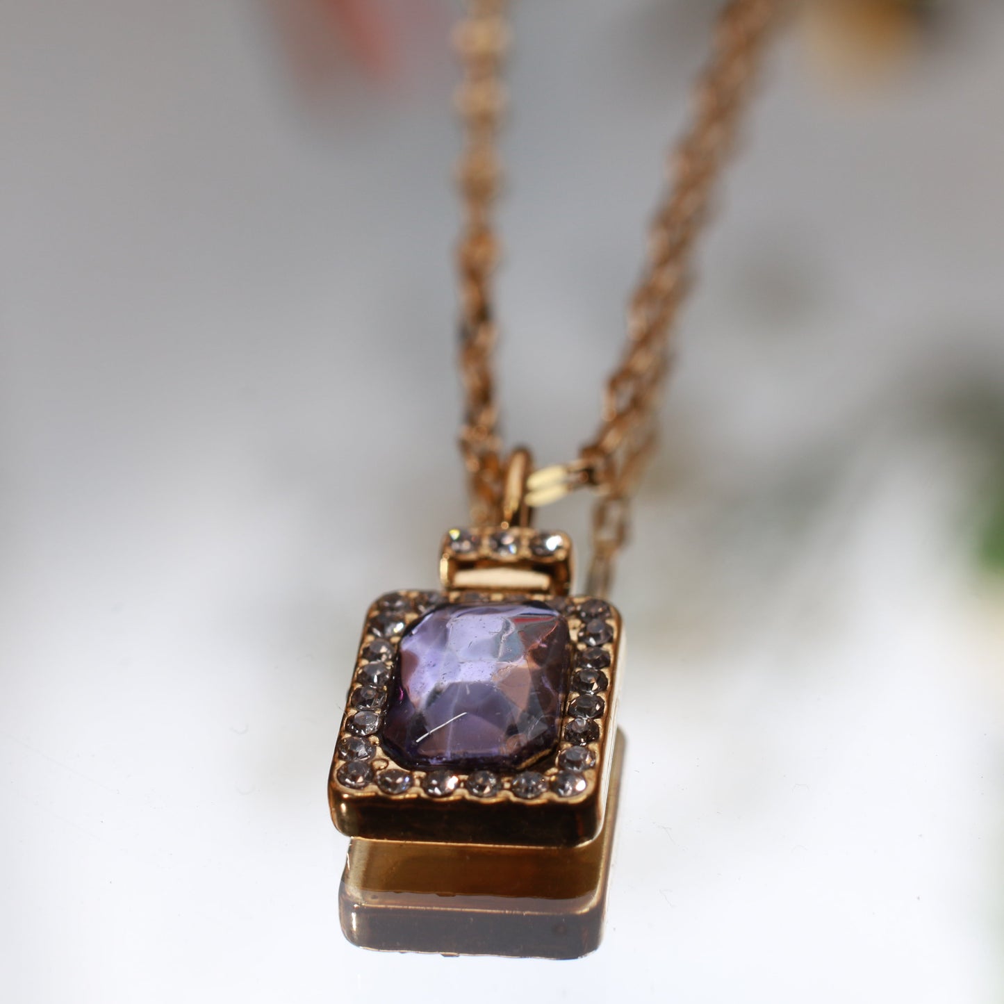 Halo Style Pendant with Purple Gemstone & Gold Chain