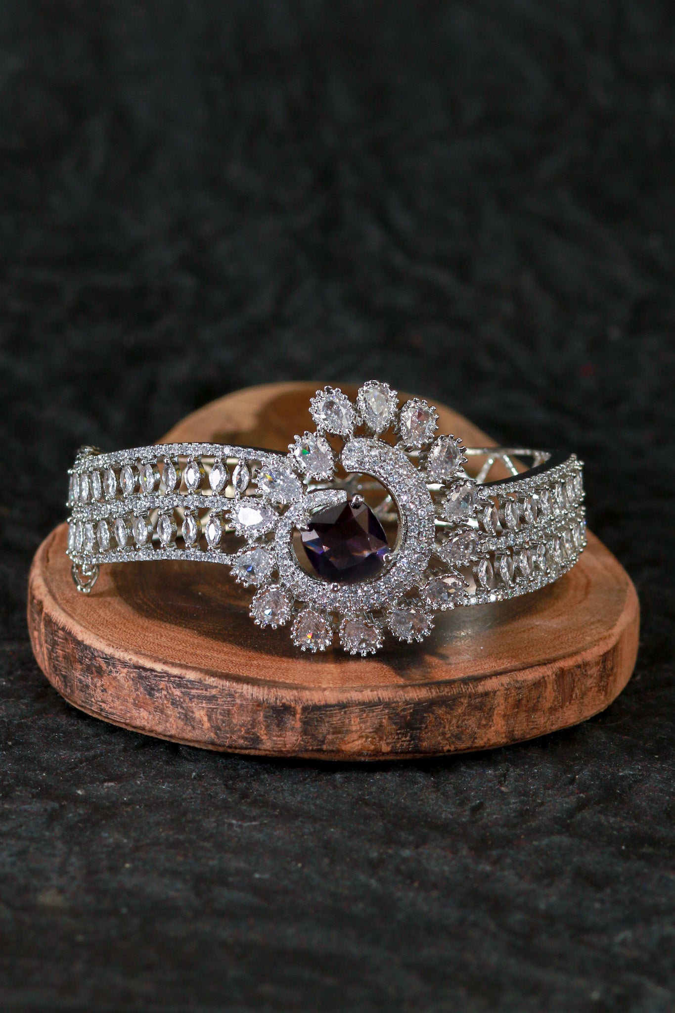 Elegant Silver Bracelet with Purple Floral Centerpiece