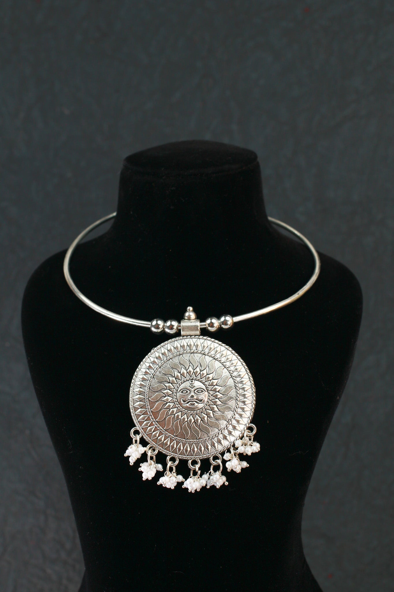 Oxidised German Silver Hansli Necklace with Sun Disc Pendant