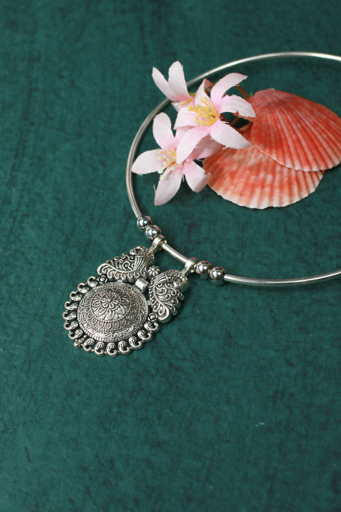 Oxidised German Silver Hansli Necklace with Antique Floral Medallion Pendant