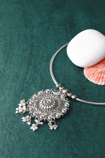 Oxidised German Silver Hansli Necklace with Ornate Floral Disc Pendant