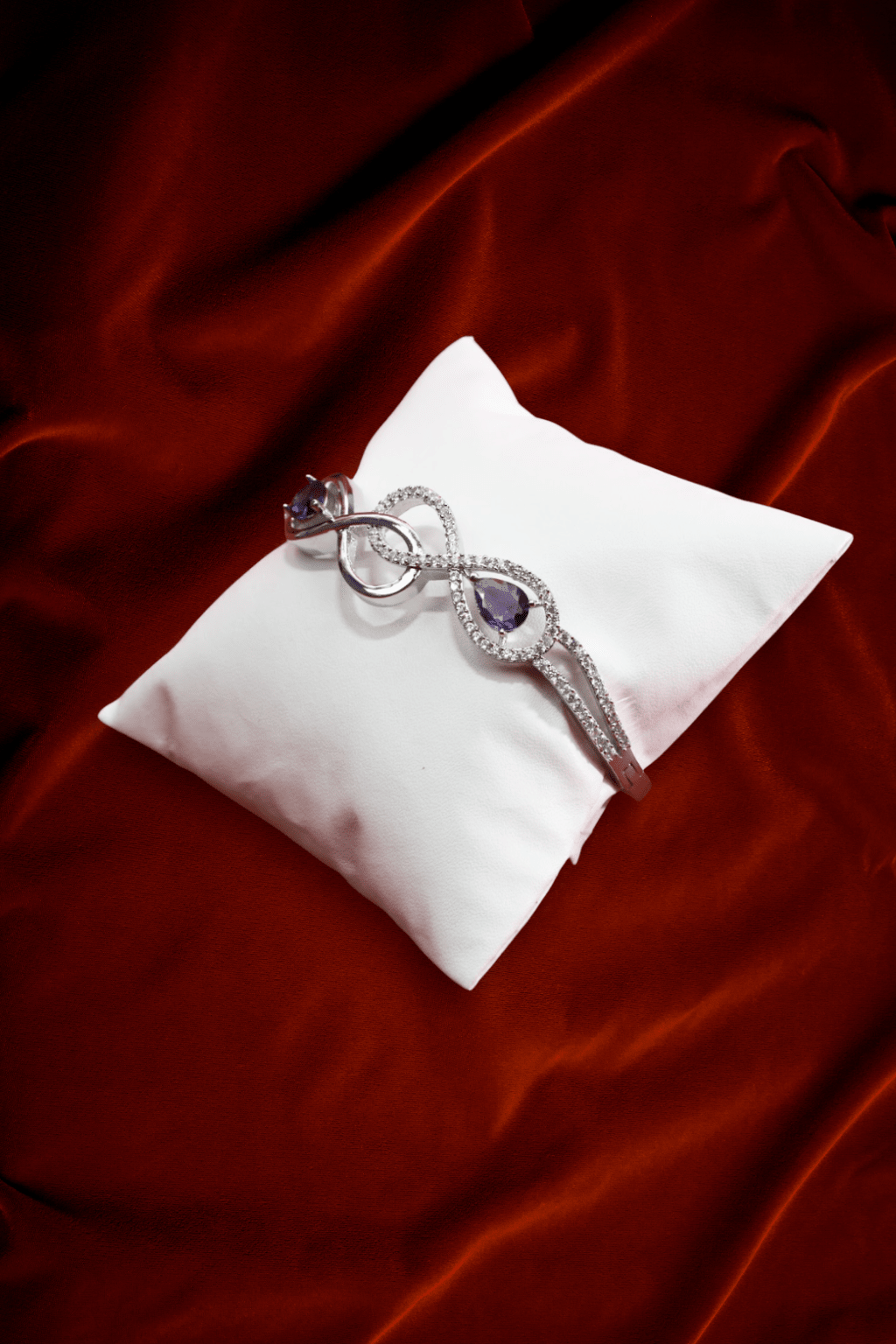 Infinity - Inspired Silver Bracelet with Dual Purple Stones - Maxiblink