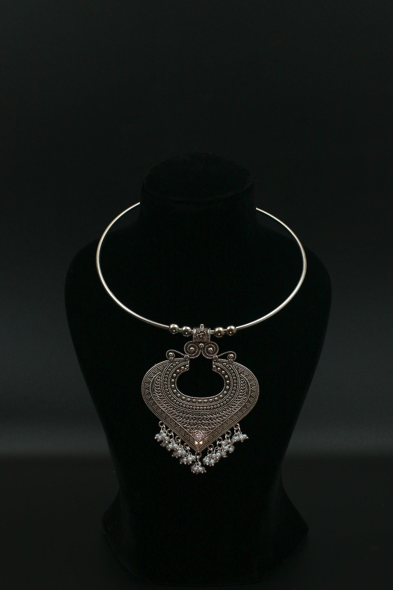 Oxidised German Silver Hansli Necklace with Heart Motif & Ghungroo Drops | Tribal Statement Choker - Maxiblink