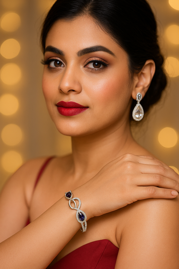 Infinity-Inspired Silver Bracelet with Dual Purple Stones