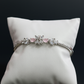 Floral Cluster Silver Bracelet with Pink Accents