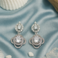 Elegant Silver Floral Drop Earrings with White CZ Stones