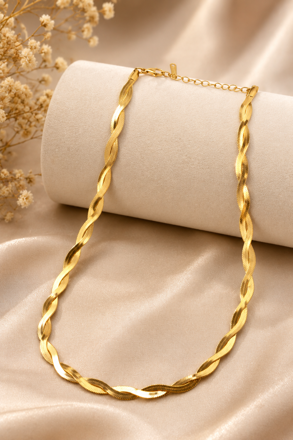 Twisted herringbone snake chain necklace, 18K gold plated – styled on jewelry stand