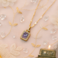 Halo Style Pendant with Purple Gemstone & Gold Chain
