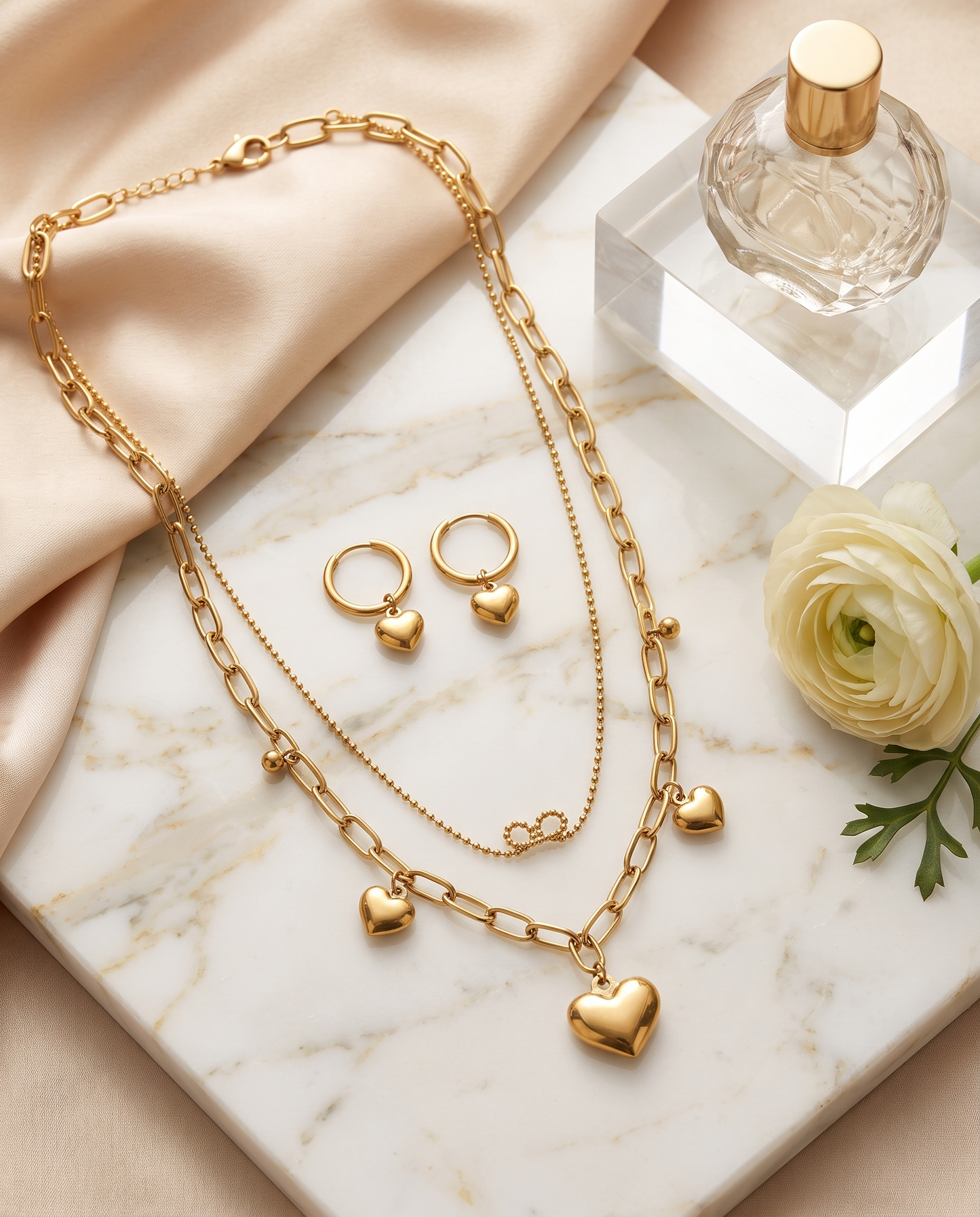 Double layer heart necklace and matching small circle heart earrings set, 18K gold plated – styled on jewelry stand