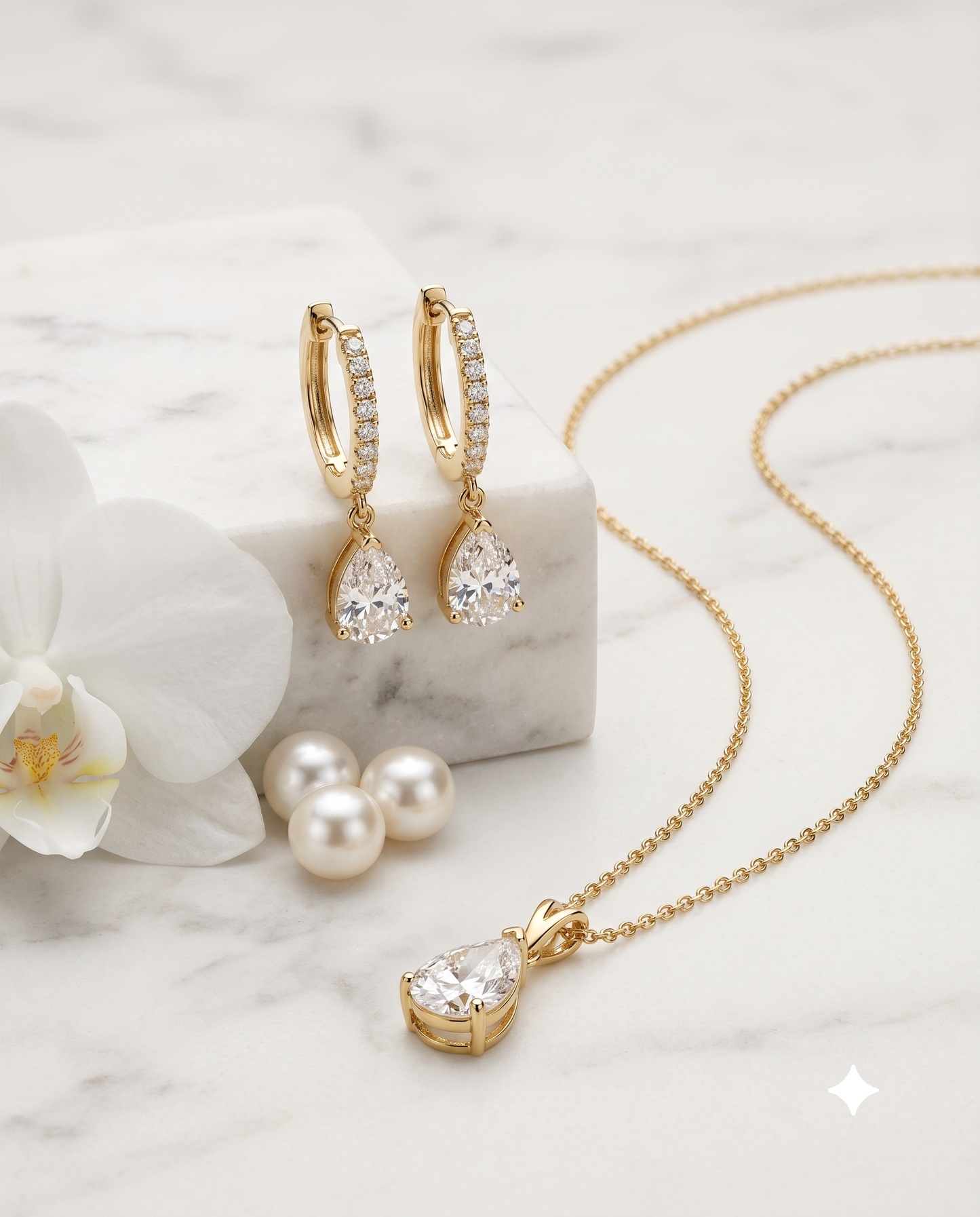 Teardrop zircon pendant necklace and matching drop earrings set, 18K gold plated – styled on jewelry stand