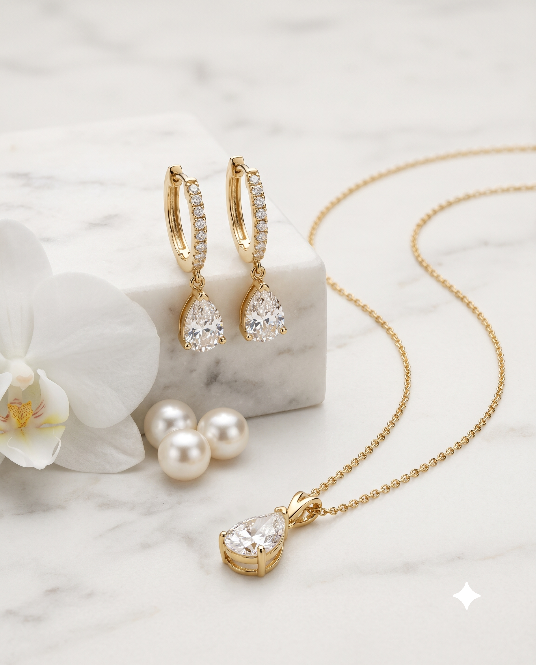 Teardrop zircon pendant necklace and matching drop earrings set, 18K gold plated – styled on jewelry stand