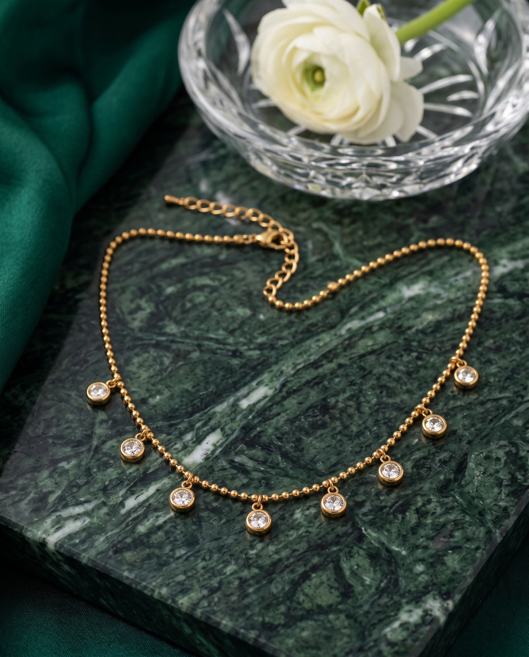 Round zircon pendant necklace, 18K furnace vacuum gold plated – styled on jewelry stand