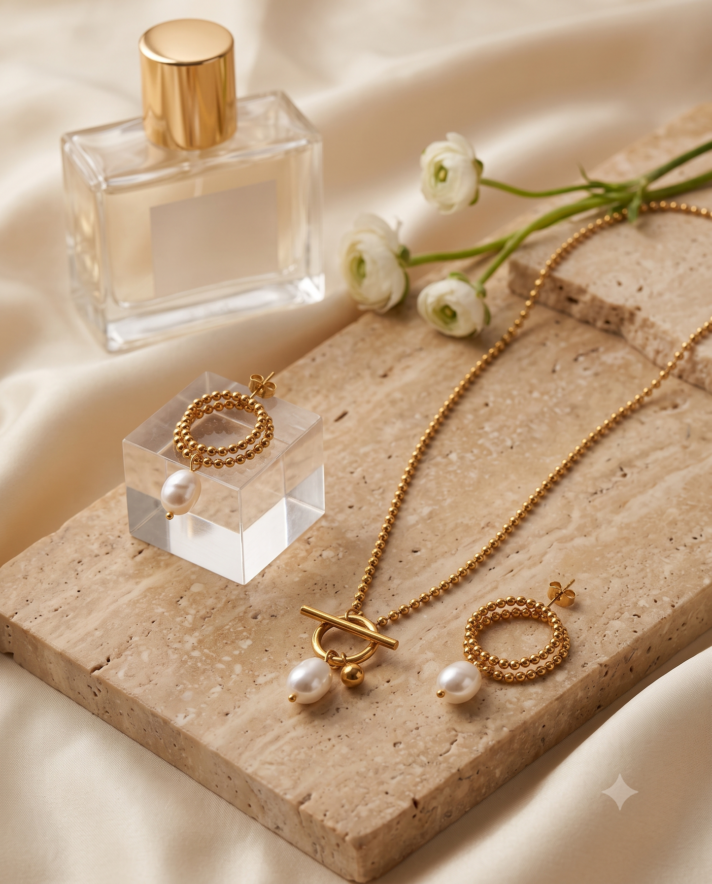 Asymmetrical pearl ball chain necklace and matching hoop earrings set, 18K gold plated – styled on jewelry stand