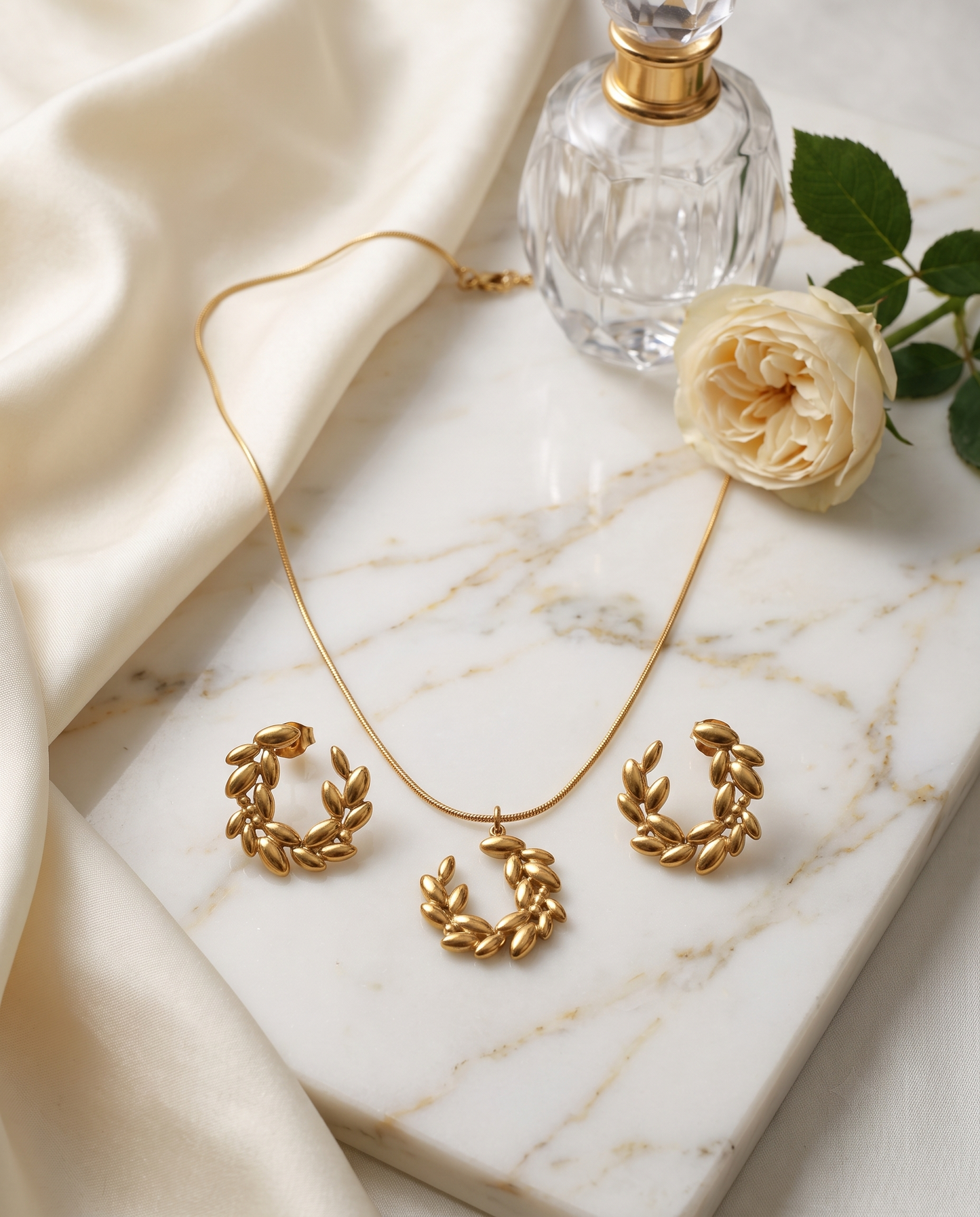 Laurel wreath pendant necklace and matching stud earrings set, gold plated – worn styled shot