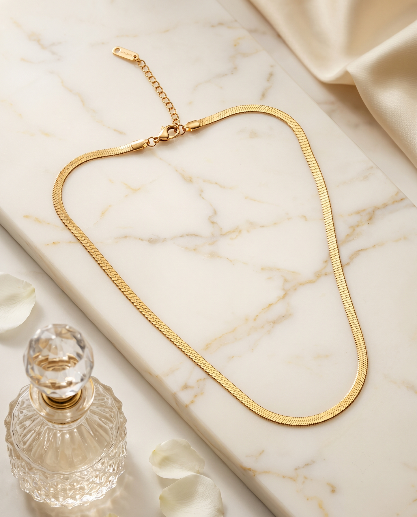 Simple XL snake chain necklace, gold plated titanium steel – styled on jewelry stand