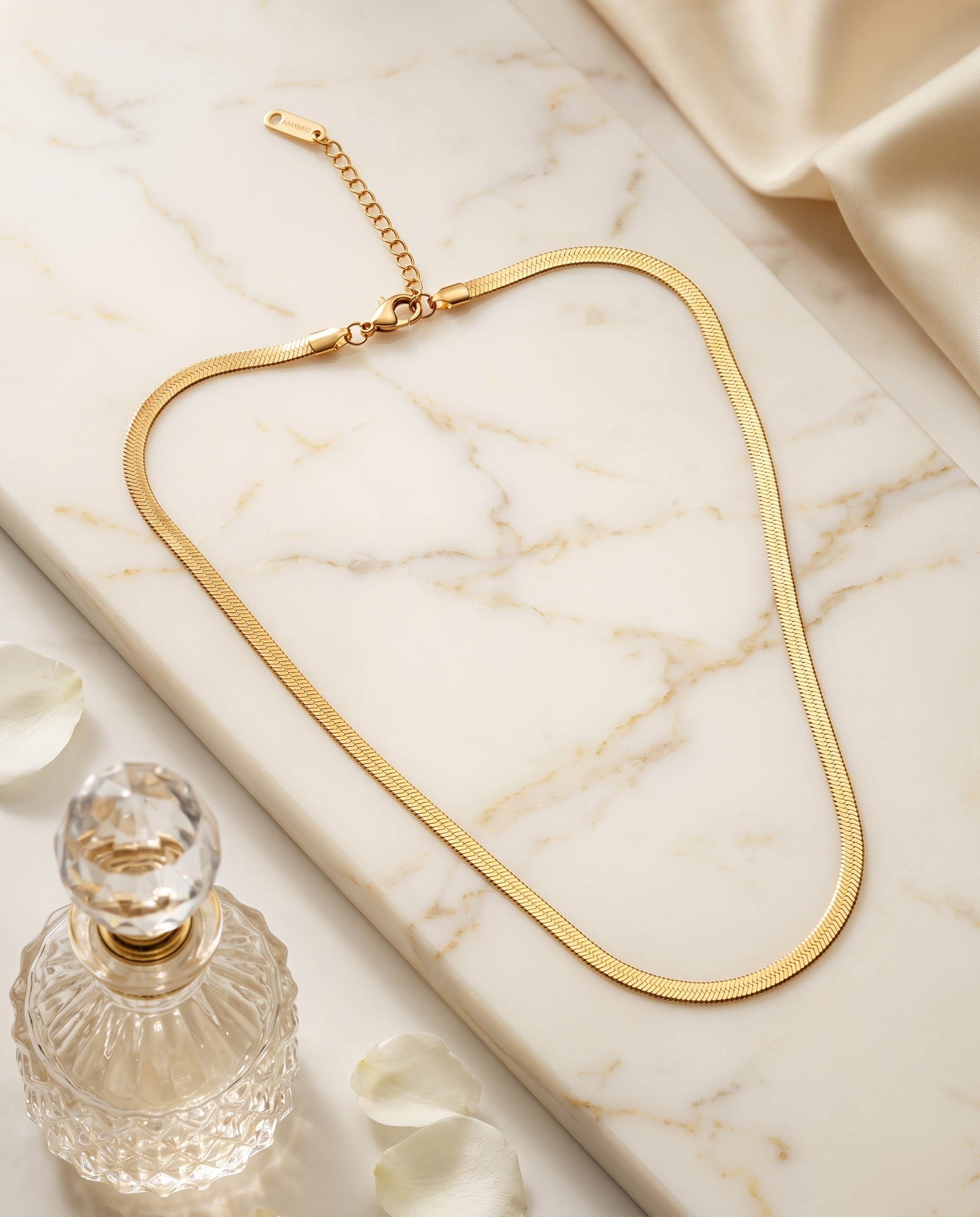 Simple XL snake chain necklace, gold plated titanium steel – styled on jewelry stand