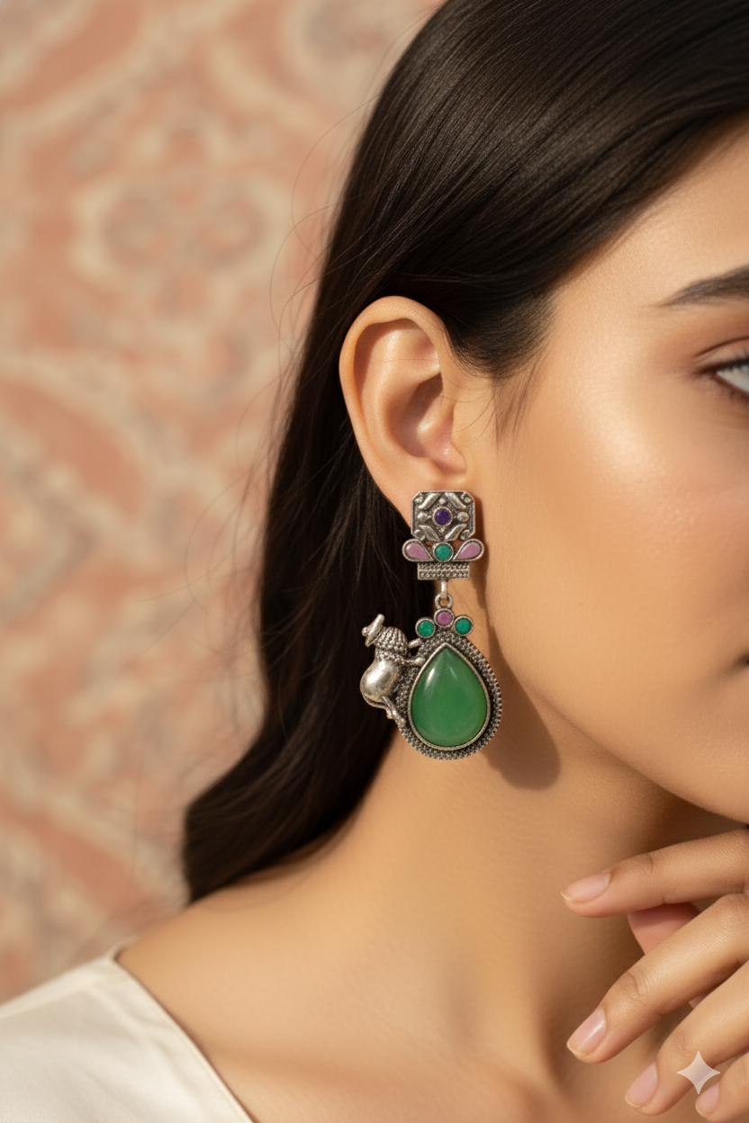 Temple Cow Motif Teardrop Earrings with Green Monalisa | Oxidised German Silver