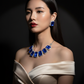 Korean Blue Rectangular Glass Stone Glass & AD Stone Necklace Set | Rhodium Plated Statement Bridal Jewelry with Earrings