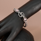 Infinity Curve Silver Bracelet with Soft Pink Stones