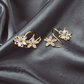 Gold Floral Clip-On Earrings with Dual Flower Design – Elegant Non-Pierced Ear Accessory