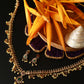 Temple Necklace Set with Pearl Clusters & Green Kundan Drop