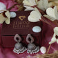 Oxidised German Silver Jhumka Earrings with Pearl Drops