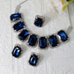 Korean Blue Rectangular Glass Stone Glass & AD Stone Necklace Set | Rhodium Plated Statement Bridal Jewelry with Earrings