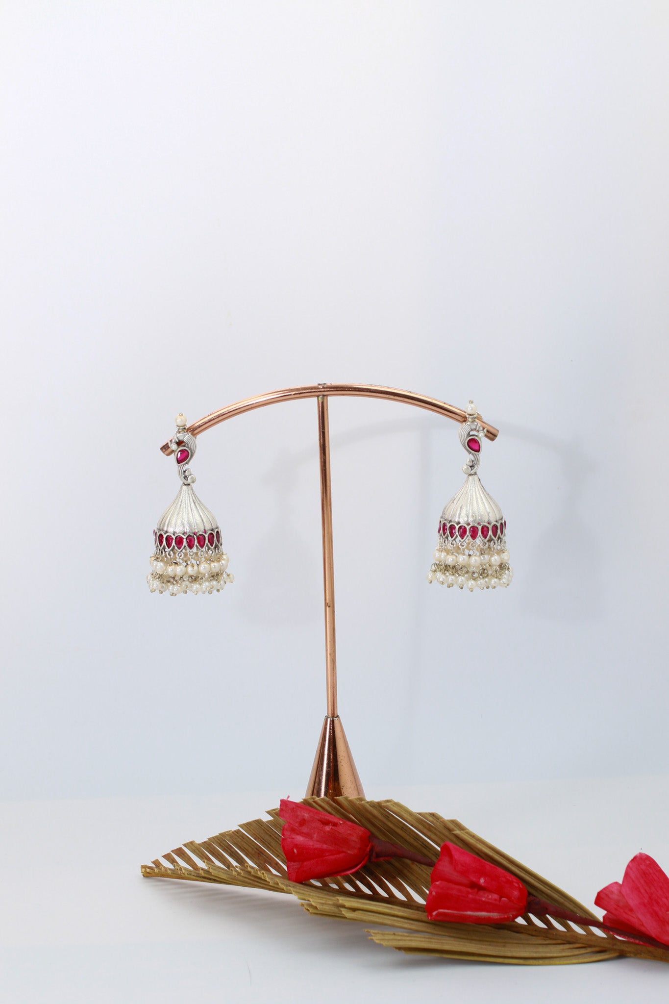 Ruby Red Jhumka Earrings in Oxidised German Silver with Pearl Tassels