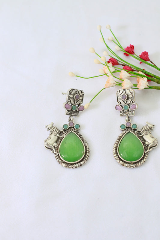Temple Cow Motif Teardrop Earrings with Green Monalisa | Oxidised German Silver