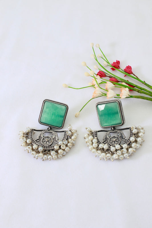 Green Monalisa Stone Half-Moon Oxidised German Silver Earrings with Pearl Tassels