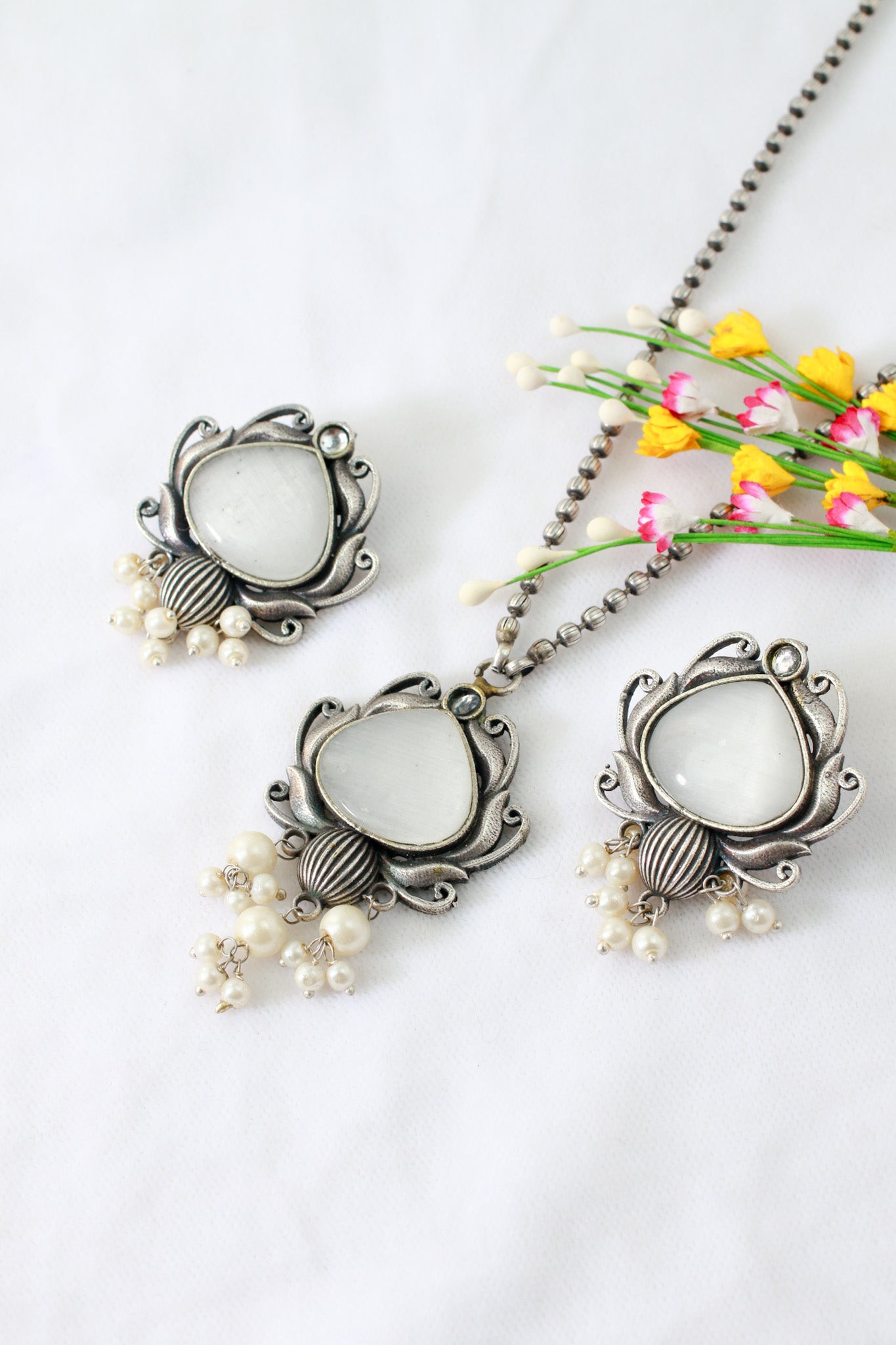 White Monalisa Lotus Pendant Set with Pearl Drops | Oxidised German Silver