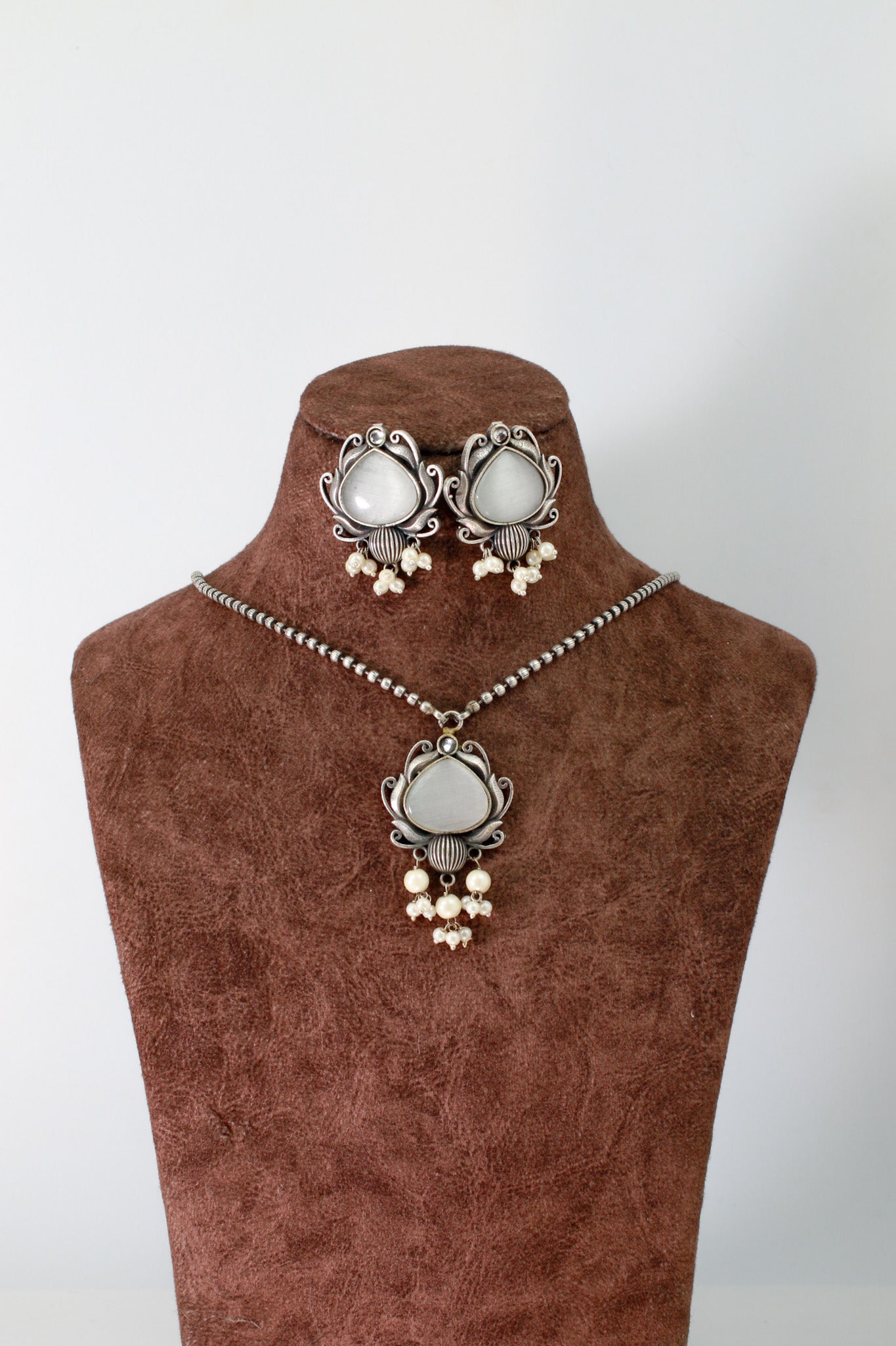 White Monalisa Lotus Pendant Set with Pearl Drops | Oxidised German Silver