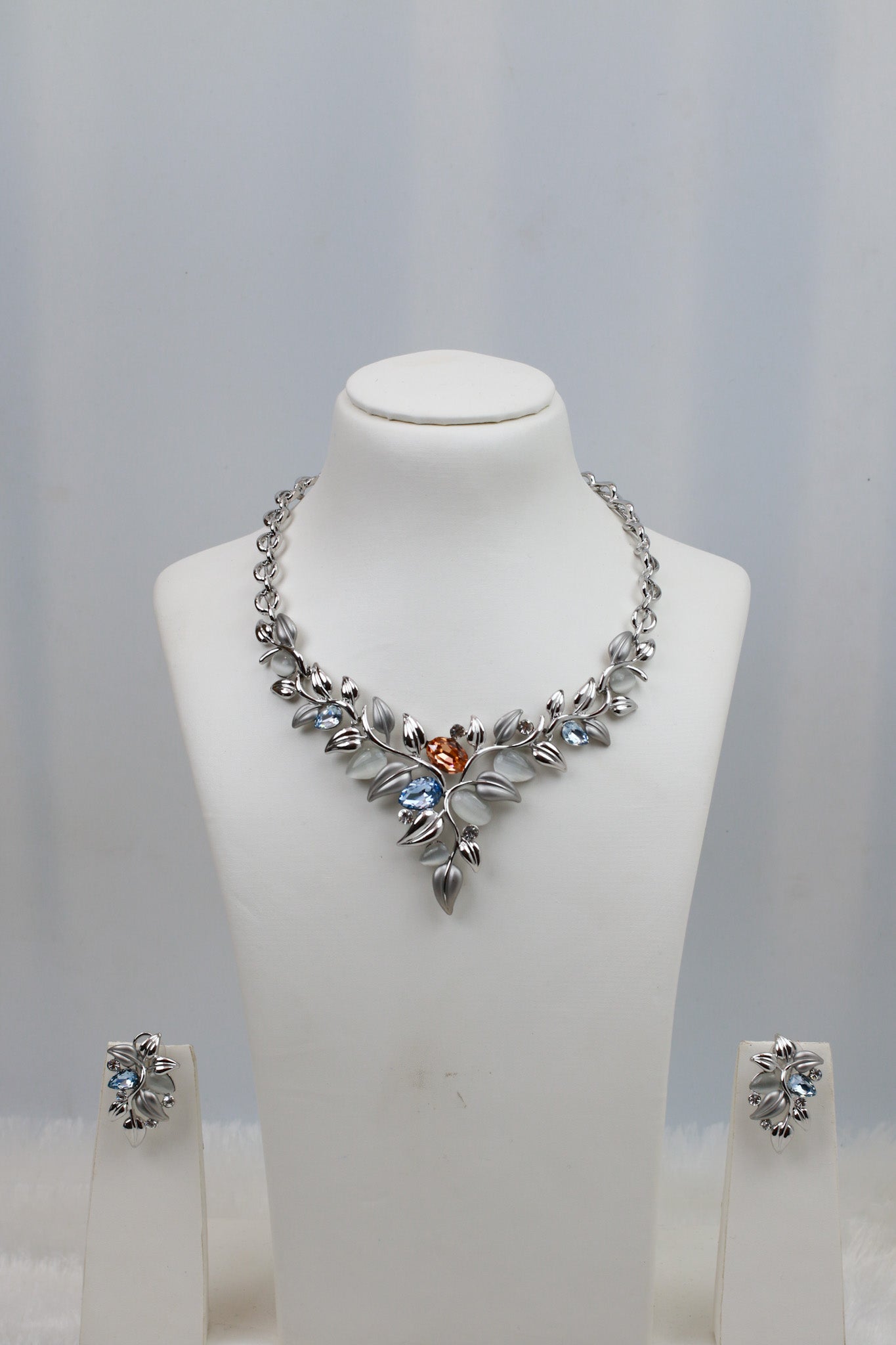 Rhodium Plated Leaf Motif AD Stone Necklace Set with Blue Accents | Silver Finish | Anti‑Tarnish