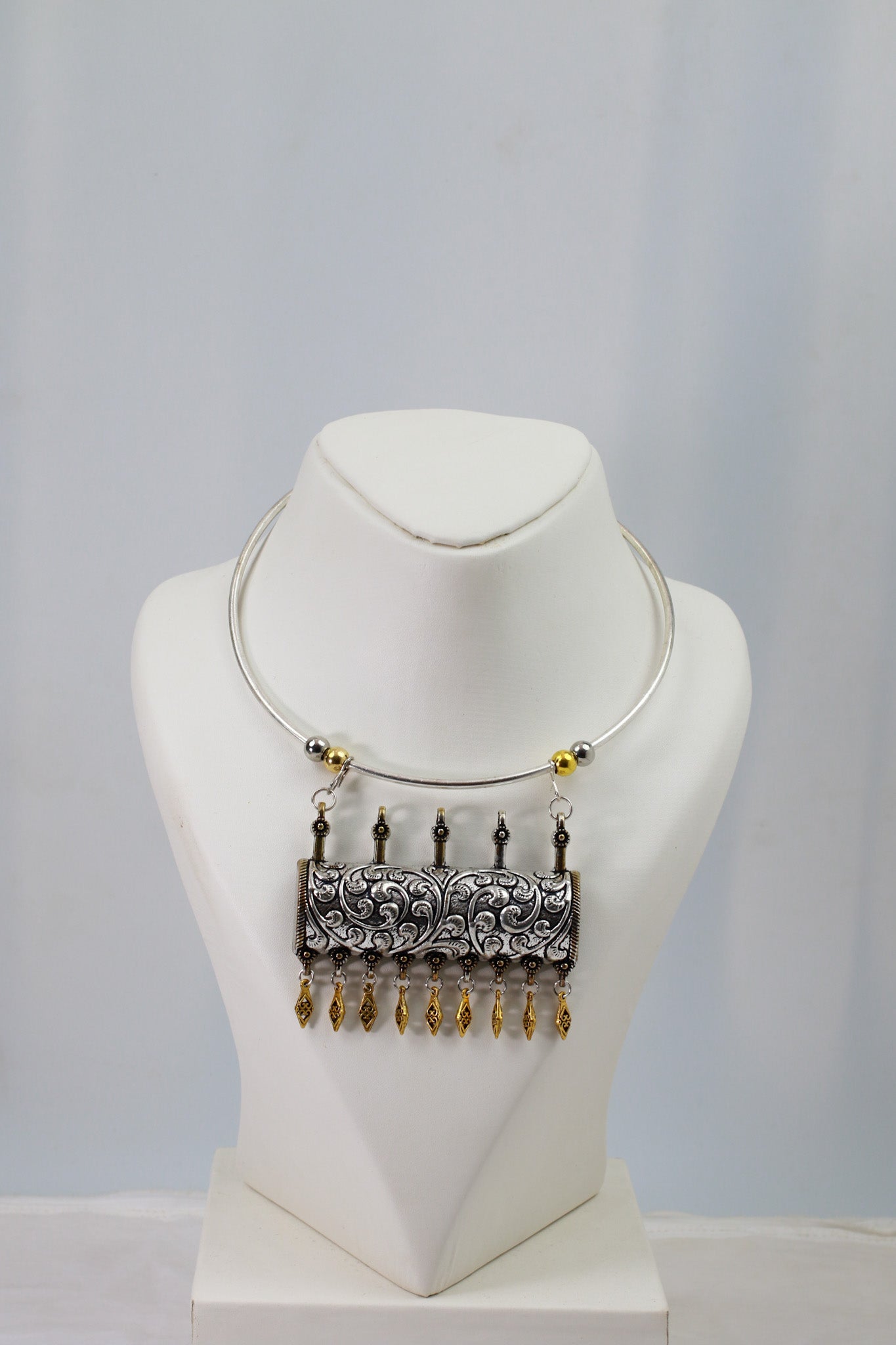 Dual Tone Oxidised German Silver Cylindrical Carved Hansuli Necklace