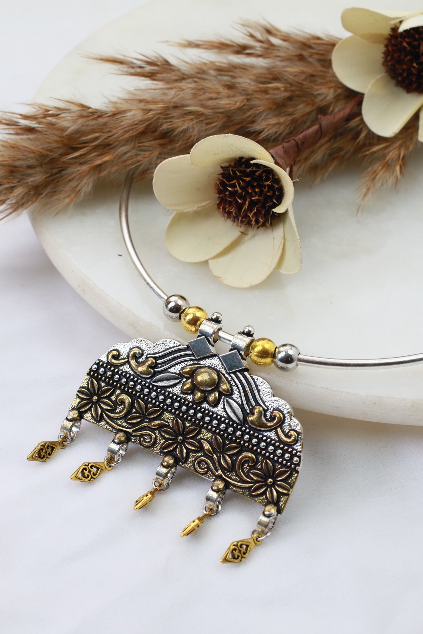 Dual Tone Oxidised German Silver Floral Temple Hansuli Necklace