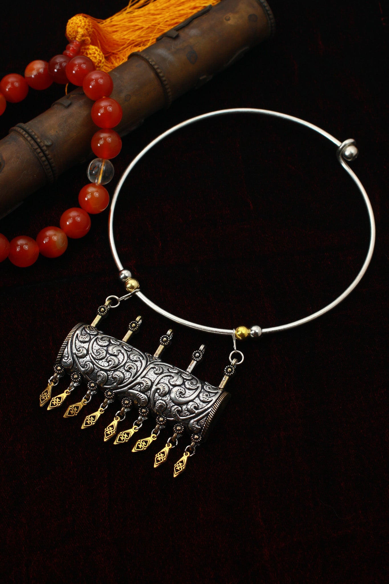 Dual Tone Oxidised German Silver Cylindrical Carved Hansuli Necklace