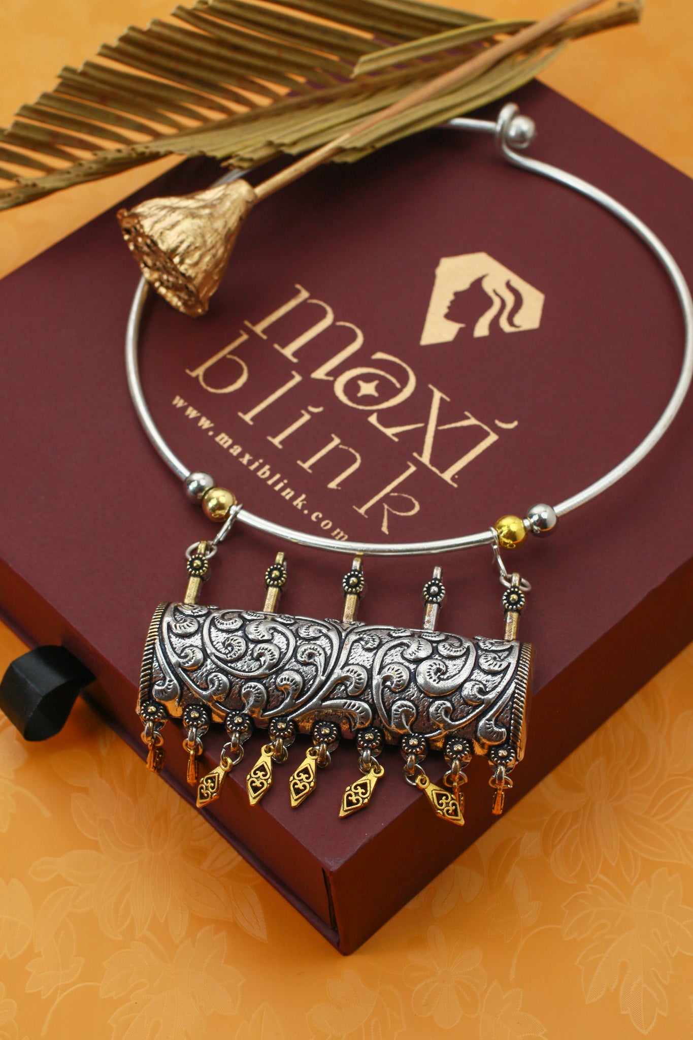 Dual Tone Oxidised German Silver Cylindrical Carved Hansuli Necklace